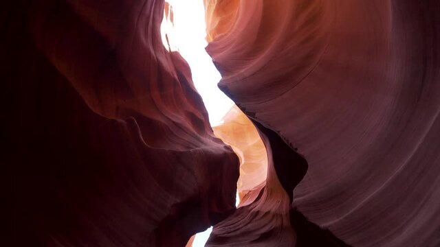 Camera moving upwards inside the sandstone formations of the Antelope Canyon in Page Arizona, USA, Shot in 4K