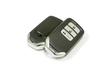 New car wave key with remote control on white background, isolated.