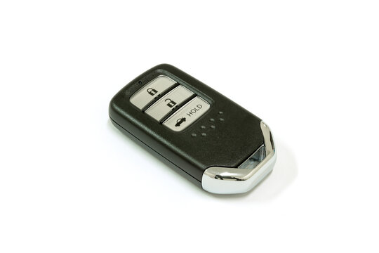 New Car Wave Key With Remote Control On White Background, Isolated.