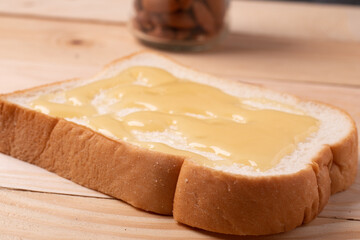 Bread with milk on a wooden background