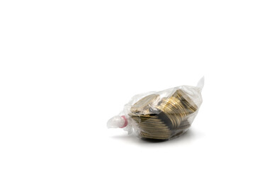 Thai Coin in Transparency plastic pack in studio light with white background.