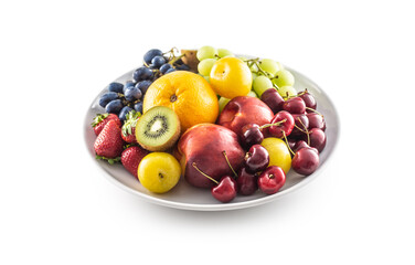 A bowl of fresh fruit on a white isolated background