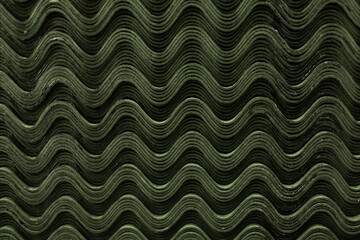 Roof green slate tiles pattern wave texture.