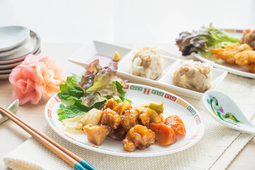 中華料理　酢豚と焼売と鶏のから揚げ