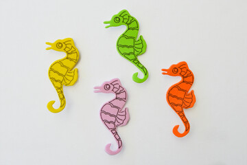 four eva rubber colors sea horse isolated on white background © claverinza