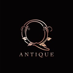 Gold Rose Q Luxury Letter Logo Template Design. Monogram antique ornate nature floral leaf with initial letter logo gold rose color