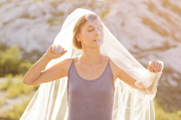 Portrait of beautiful woman in polyethylene wrap. Ecology concept. 