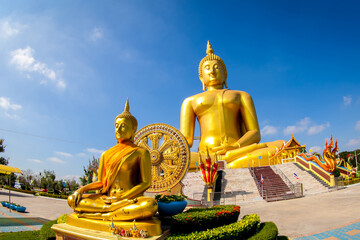 Beautiful of Large golden sitting Buddha statue with background of blue sky at Wat Muang  temple ,Ang Thaong,Thailand