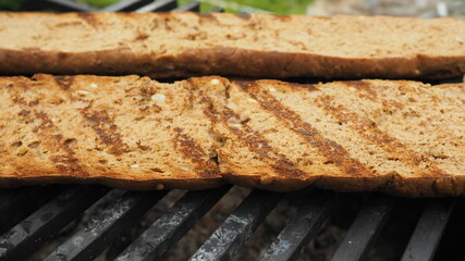 fried bread on the grill. the food on the fire