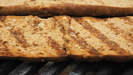 fried bread on the grill. the food on the fire