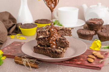 Chocolate biscuits with chocolate on a beige background. Biscuit day