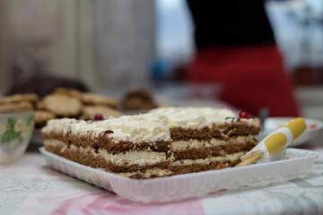 cut cake lies on the table
