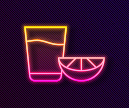 Glowing neon line Tequila glass with lemon icon isolated on black background. Mexican alcohol drink. Vector.