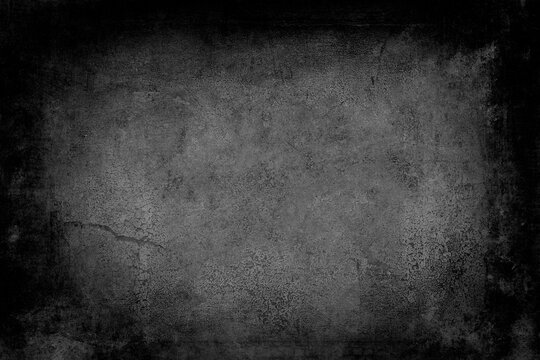 old wall background or texture with black vignette boders