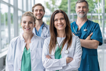 Group of medical staff smiling at the hospital.