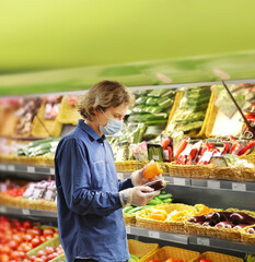 Supermarket shopping, face mask and gloves,man buying vegetables at the market	