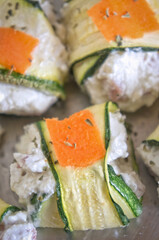 Grilled zucchini rolls stuffed with cheese