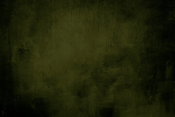 green grunge background or texture with dark vignette borders and spotlight
