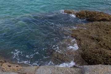 Rocky coastline in the sea