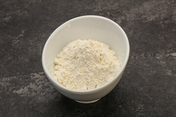 Wheat flour heap in the bowl