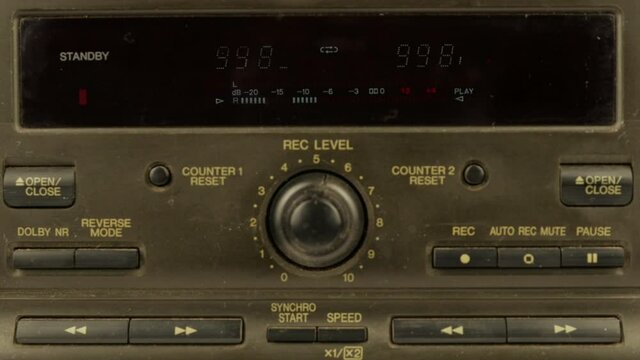 Audio Cassette In The Tape Recorder Playing And Rotates