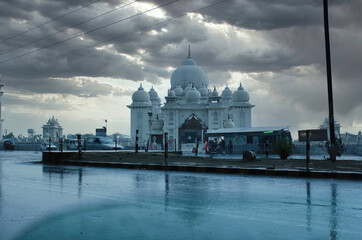 Mathura, India - May 11, 2012: Baba jai gurudev temple next to national highway in between Uttar...