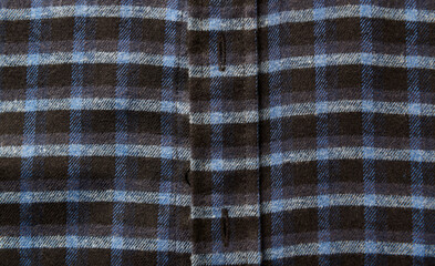 Close up of Men's checkered shirt.