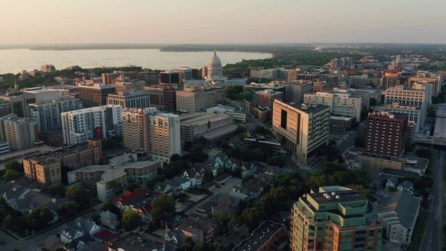 Aerial sunset panorama of Madison in Wisconsin. Downtown buildings and streets