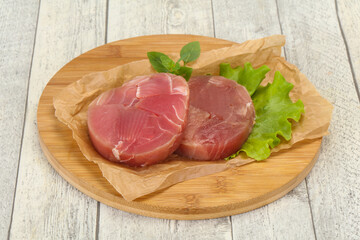 Raw tuna round steak for grill