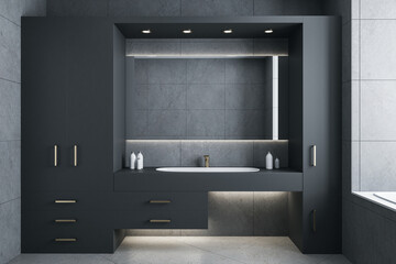 Gray bathroom with mirror and comfortable washbasin.