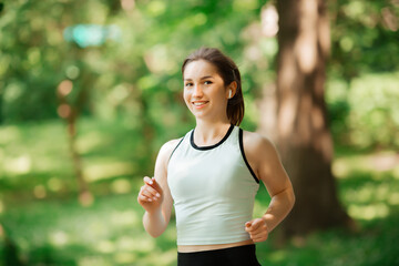 girl goes in for sports in the park of europe