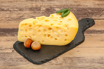 Maasdam cheese - yellow triangle with holes
