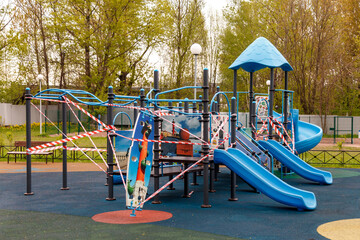 Children's Playground is closed due to pandemic, epidemic. Ban on children's playgrounds. Prevention of covid-19 coronavirus. Fight against virus. Self-isolation mode. Stay at home!