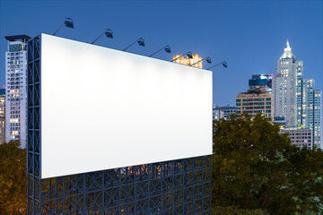 Obraz premium Blank white road billboard with Bangkok cityscape background at night time. Street advertising poster, mock up, 3D rendering. Side view. The concept of marketing communication to sell idea.
