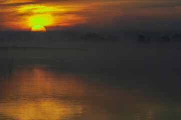 Obraz premium Beautiful sunrise on the lake. Polish sunrise