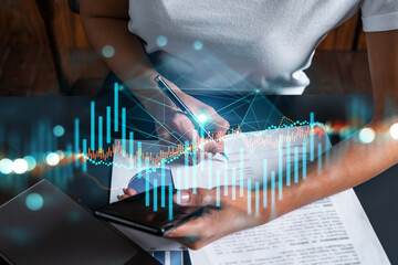 Forex Graph drawing and a woman signing contract use phone. Double exposure. Financial analysis concept.