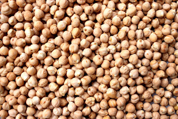 uncooked fresh chickpeas on background. small dry chickpeas