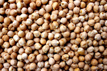 uncooked fresh chickpeas on background. dry chickpeas