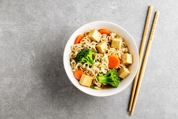 Vegan asian soup with noodles and tofu