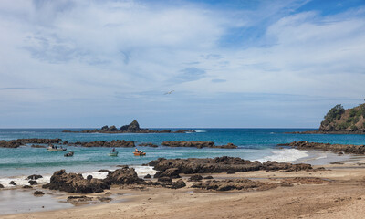 Beach with boats in Whananaki, New Zealand