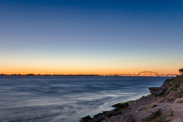 C/2020 F3, or Comet Neowise, rising over the coast in the early morning twilight hours. Fire Island Inlet Bridge - Long Island New York