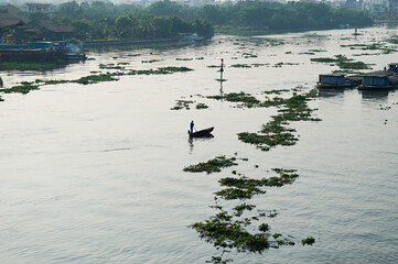 Small Boats and Barges on River