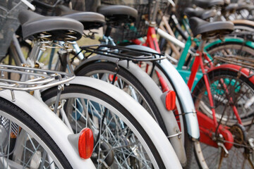 Fototapeta na wymiar Parked Bicycles all together