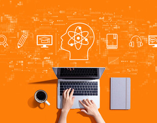Online education concept with person using a laptop computer