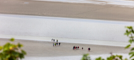 Mudflat hiking tour in the bay of Mont Saint-Michel, France