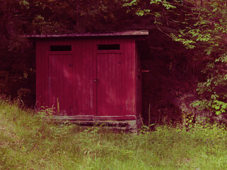 Purple outdoor restroom