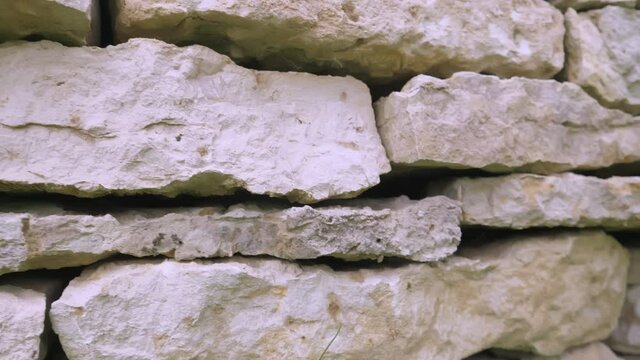 The pile of the limestone rock on the wall in Estonia.4K