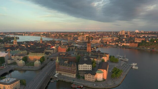 Sunset over Stockholm City Center Sweden, Aerial circle view 