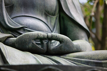 Buddah statue hands close up