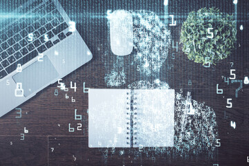 Double exposure of data theme drawing hologram over topview work table background with computer. Concept of technology.